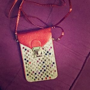 Red purse with rhinestones